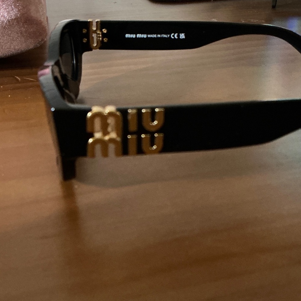 Miu Miu Dark Sunglasses - Picture 3 of 5